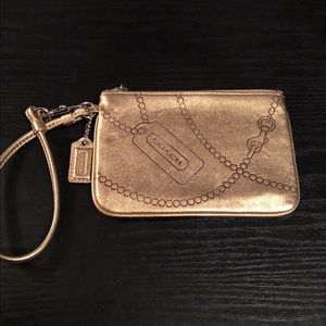 Coach gold leather wristlet